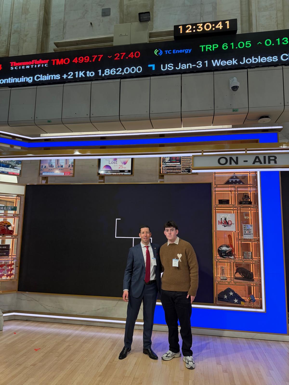 On the NYSE broadcast set in front of the ON-AIR sign